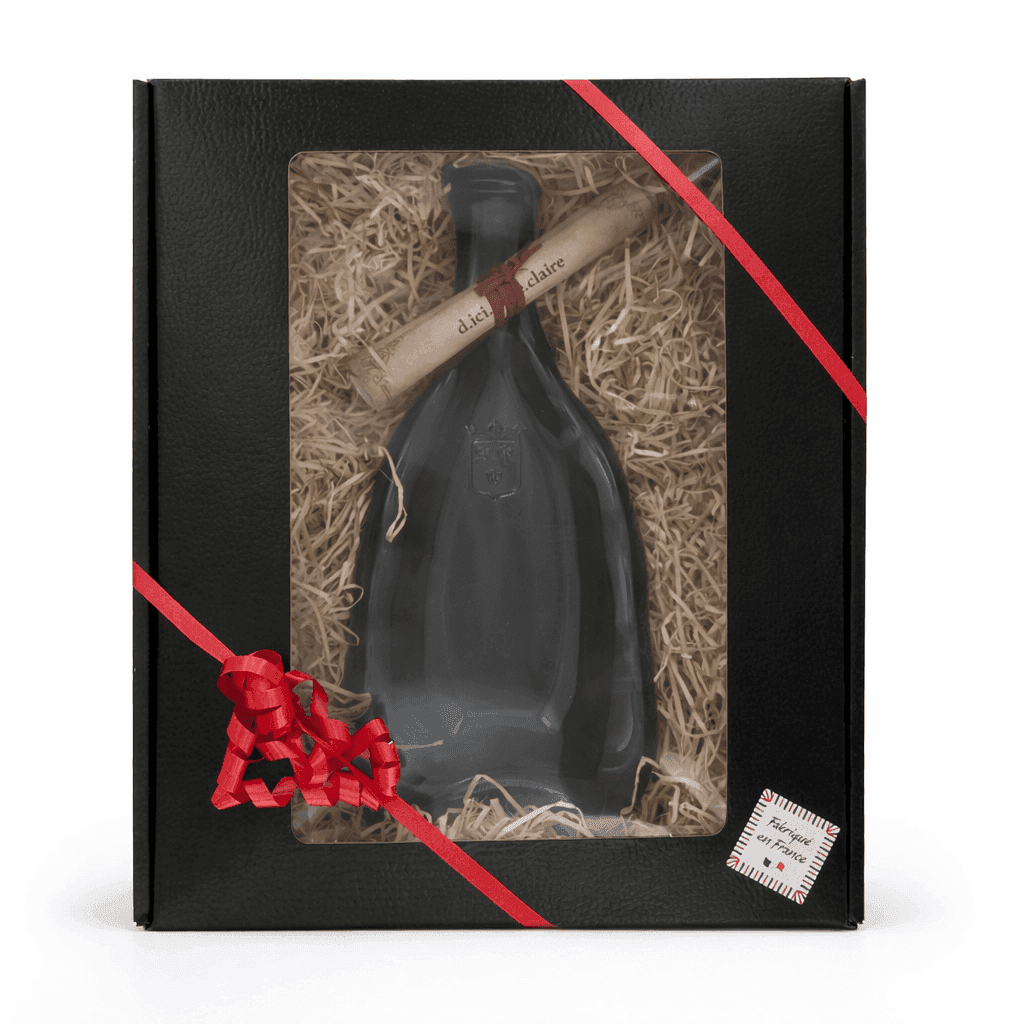 Coffret cadeau avec une bouteille de vin déformée dans un coffret noir en carton .D'Ici et de Claire 